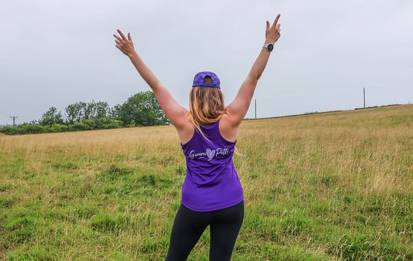 Showcasing Gemma Potts Community running merchandise for a running challenge in 2024.