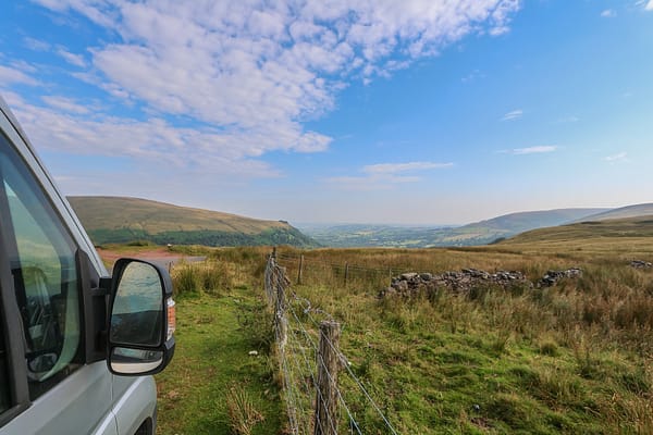 Stunning views from the side of the road when travelling through the Brecon Beacons in Wales, learn how to start vanlife to begin living your best life on the road.