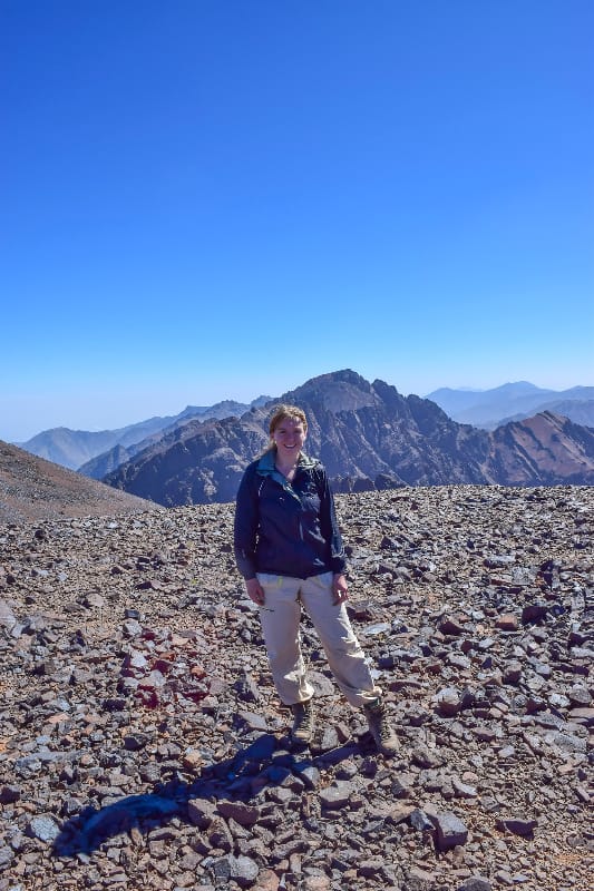 Standing atop Timzguida Peak, the highest point of Mount Ouanoukrim.